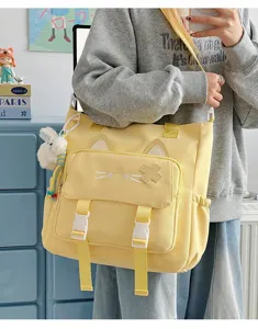 Süße Segeltuch Umhängetasche mit Katzenohren Design, lässige Kuriertasche für den Alltag.