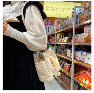 Canvas Eimer Tasche für Damen, süßes Smiley Gesicht Design, lässige Alltagstasche und Bento-Bag.