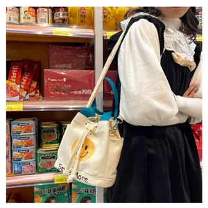 Leinwand Eimer Tasche für Damen, niedliches Smiley Design, lässige Handtasche für Alltag.