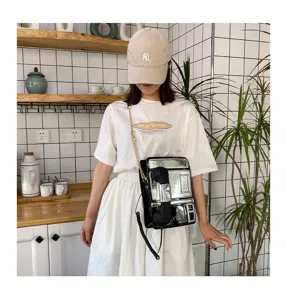 Kreative Umhängetasche in Retro-Telefon-Form für Damen, schwarzes Lackleder mit Kette.