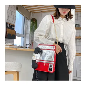 Neuheit Telefon Form Umhängetasche für Damen, kreative Retro Handtasche mit Kette.
