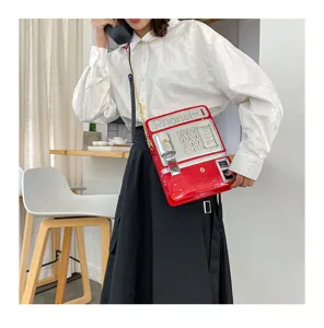 Kreative Retro Telefon Form Umhängetasche, ausgefallene PU Leder Handtasche für Damen.