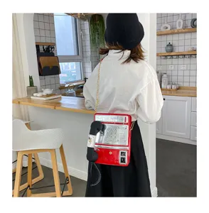 Kreative Umhängetasche in Telefon-Form für Damen, einzigartige witzige Retro Handtasche.