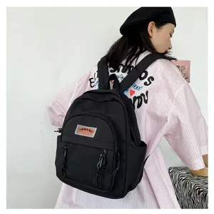 Kompakter schwarzer Mini Rucksack für Reisen, vielseitiger lässiger Tagesrucksack Damen.