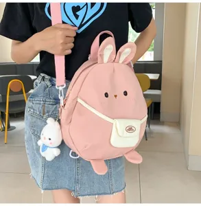 Zaino carino in nylon per donna, borsa scolastica rosa di grande capacità con orecchie di coniglio.