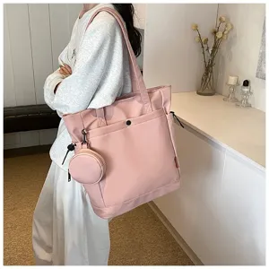 Stylish pink canvas tote bag with coin pouch, large capacity shoulder bag for daily use.
