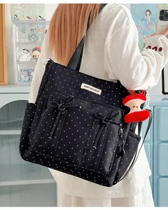 Vista detallada bolso shopper lona lunares negros, bolsillos lazo bonitos, gran capacidad.