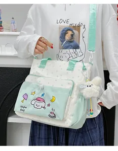 Süße Canvas Umhängetasche für Schüler mit Cartoon-Bestickung, mintgrün und weißes Design.