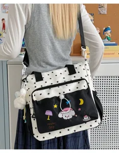 Detailansicht der niedlichen Schüler Segeltuch Umhängetasche mit Sternenmuster und Stickerei.