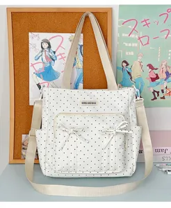 Bonito bolso de lona con lunares y lazo, espacioso bolso de hombro para uso diario y casual.
