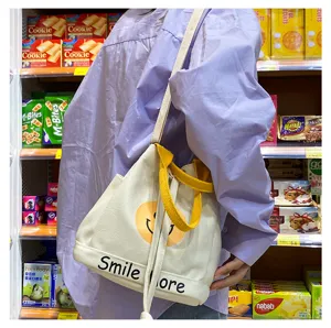 Segeltuch Eimer Tasche für Damen, süßer Smiley Druck Schulter Handtasche, lässige Bento Tasche.
