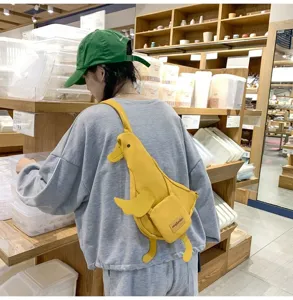 Süße Enten Canvas Brusttasche für Damen, stylische Umhängetasche mit gelbem Design.