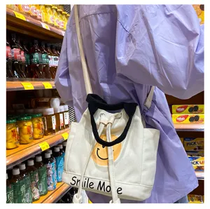 Leinwand Umhängetasche für Damen, süße Smiley Gesicht Canvas Handtasche mit schwarzen Henkeln.