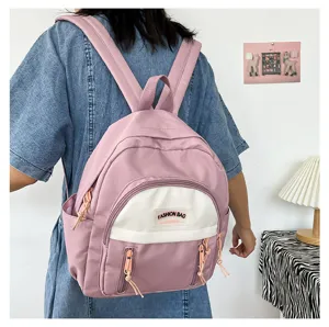 Rosa lässiger Mini-Rucksack für Damen, stilvoller kleiner Tagesrucksack für Reisen.