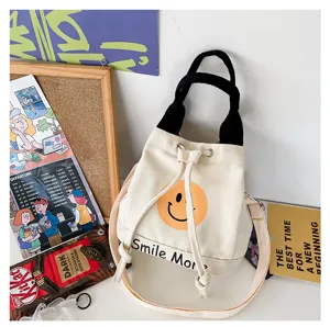 Canvas Eimer Tasche mit süßem Smiley Gesicht Druck, lässige Schulter und Handtasche für Alltag.