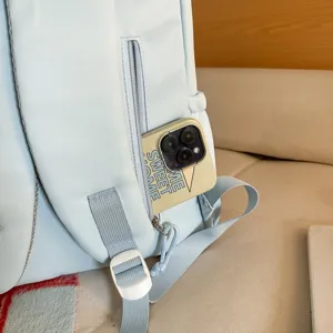 Hellblauer Canvas Schulrucksack Freizeitrucksack mit Reißverschlusstasche verstellbar.