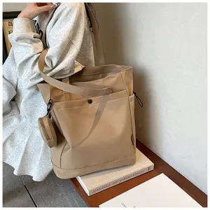 Large capacity canvas tote bag in khaki with coin pouch, stylish shoulder bag for daily use.