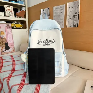 Japanischer süßer Rucksack im College-Stil für Damen, farblich abgesetzt, großes Volumen.
