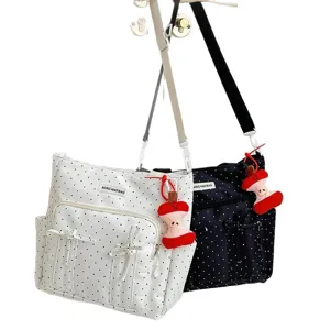 Bolso de lona con lunares lindo con lazo y colgante de manzana para mujeres y estudio.