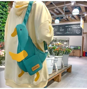 Süße Ente Canvas Sling Tasche für Damen, lustige Cartoon Umhängetasche mit verstellbarem Gurt.