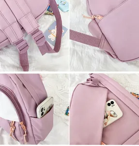 Detailansicht eines kleinen lila Freizeitrucksacks mit verstellbaren Trägern und Taschen.