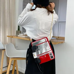 Kreative rote silberne Telefon Umhängetasche mit Kette und Retro Telefonhörer Design stilvoll.