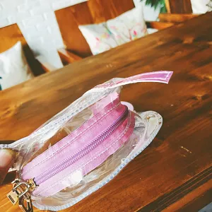 Transparente PVC Kosmetiktasche mit rosa Reißverschluss, tragbarer Aufbewahrungsbeutel für Reisen.