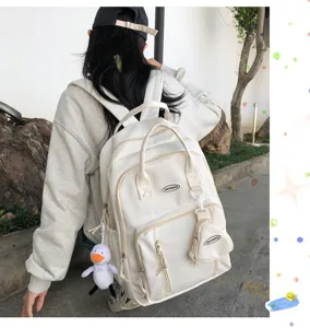 Mochila minimalista de color solido de gran capacidad para estudiantes de viaje diario