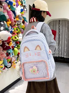 Zaino ita a quadri blu con gatto carino per studenti, bella borsa scolastica con finestra.