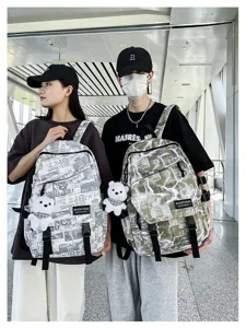 Trendy graffiti canvas school backpack for men and students with a cute bear pendant