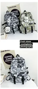 Trendy graffiti canvas backpack with newspaper print and cute bear pendant for daily school use.