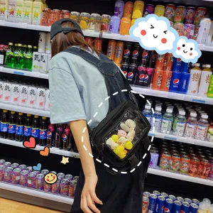 Transparent canvas crossbody bag with clear window, cute doll display pocket and strap.