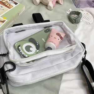 White canvas crossbody bag with clear front pocket, ins style casual transparent shoulder bag.