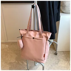 Pink large capacity tote bag with coin purse, perfect for casual daily use, shopping and travel.