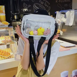 White clear pocket shoulder bag with plush toys, casual canvas crossbody bag for women.