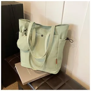 Large capacity green tote bag with small coin purse, stylish shoulder bag for women.