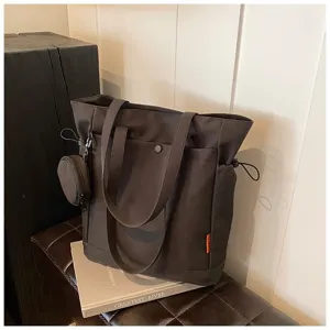 Large capacity dark brown canvas tote bag with shoulder straps, coin purse and multi pockets.