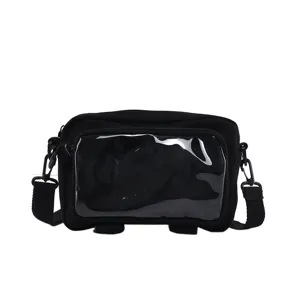 Black canvas crossbody bag with clear transparent front window for pins and dolls.