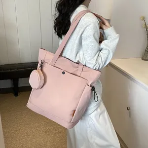 Chic pink canvas tote bag with coin pouch, large capacity shoulder handbag for women everyday.
