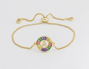 Gold plated colorful zirconia letter A adjustable bracelet detailed view of charm and chain.