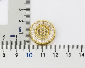 Gold plated letter B crystal pendant detail shot showing micro pave zircon craftsmanship and size.