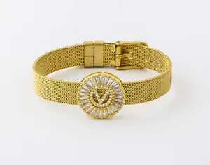 Gold plated mesh watch strap bracelet with sparkling cubic zirconia letter centerpiece.
