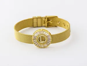 Detailed view of gold plated mesh bracelet with sparkling cubic zirconia letter pendant.