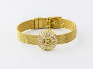 Gold plated mesh band bracelet featuring a sparkling round cubic zirconia letter F.