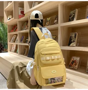 Zaino casual giallo in stile Ins con finestra trasparente e tasche multiple per ogni giorno.