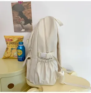 Zaino casual da studente beige dettaglio tasca laterale, design resistente per borsa scolaresca.