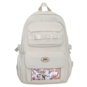 Vista di dettaglio dello zaino beige multitasche con finestra frontale trasparente.
