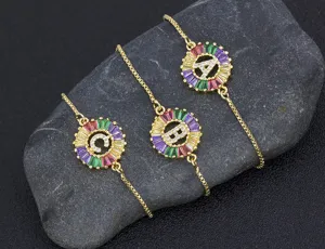 Detailed view of the exquisite gold-plated colorful alphabet zirconia pendant bracelet.