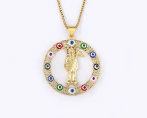 18K gold plated evil eye scythe reaper pendant necklace with sparkling cubic zirconia stones.