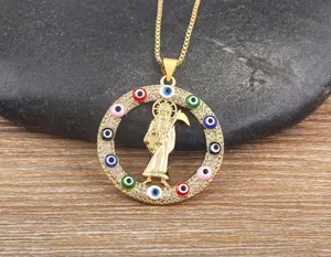 Detailed view of vintage grim reaper scythe pendant with colorful evil eye zircon and gold chain.